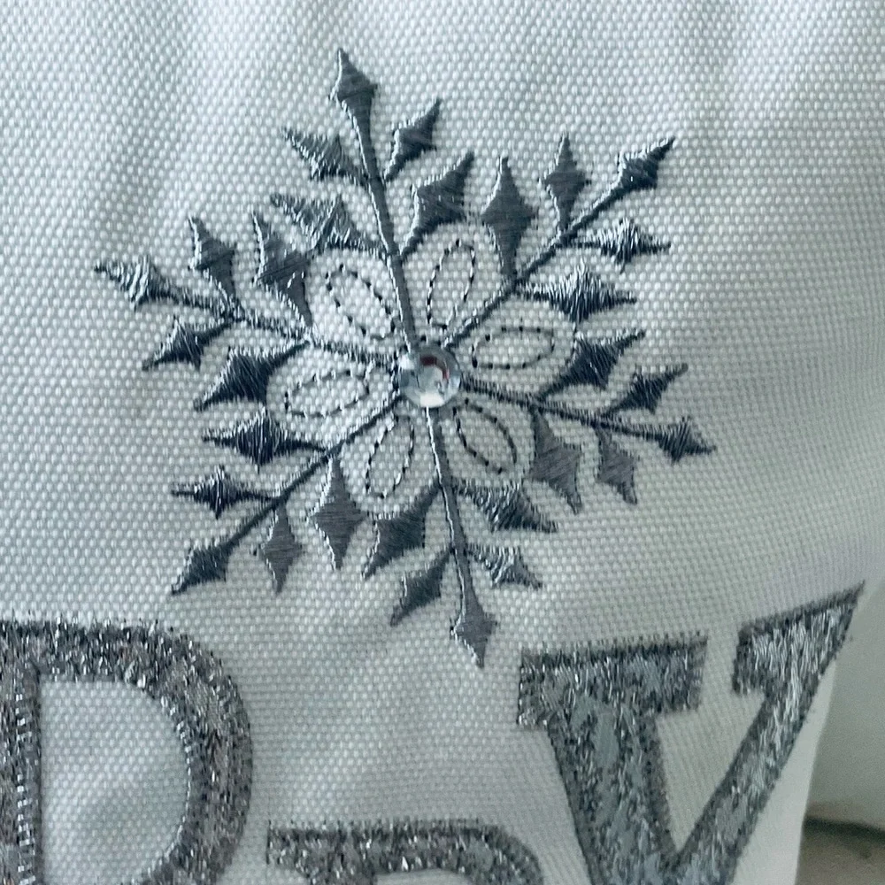 “Merry” silver metallic embroidered on white snowflake holiday Christmas pillow